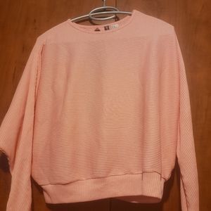 Pink ribbed open back sweater